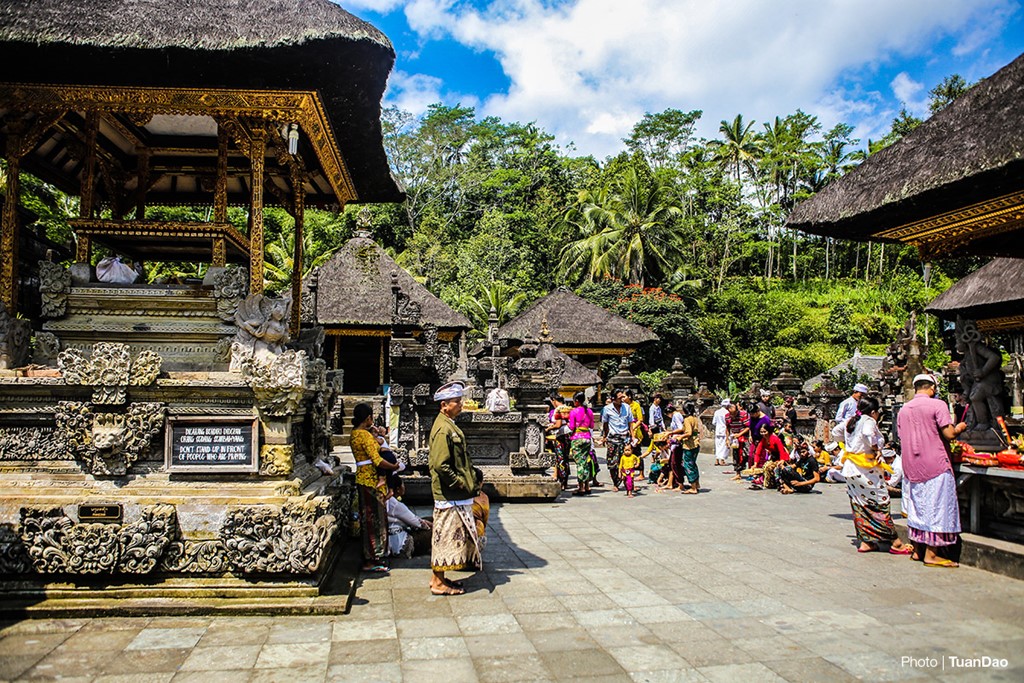 Holy bath in sacred Empul Pura Tirta temple in Bali